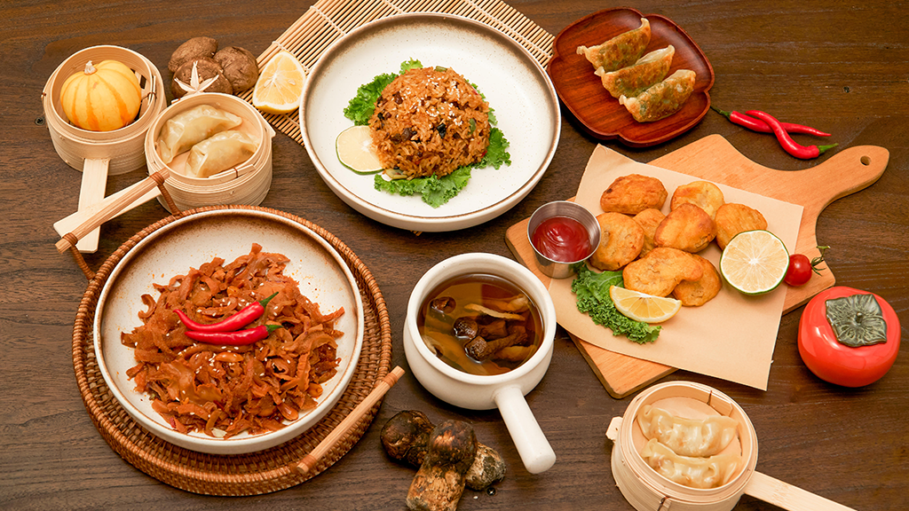 A variety of Asian dishes spread out on a table